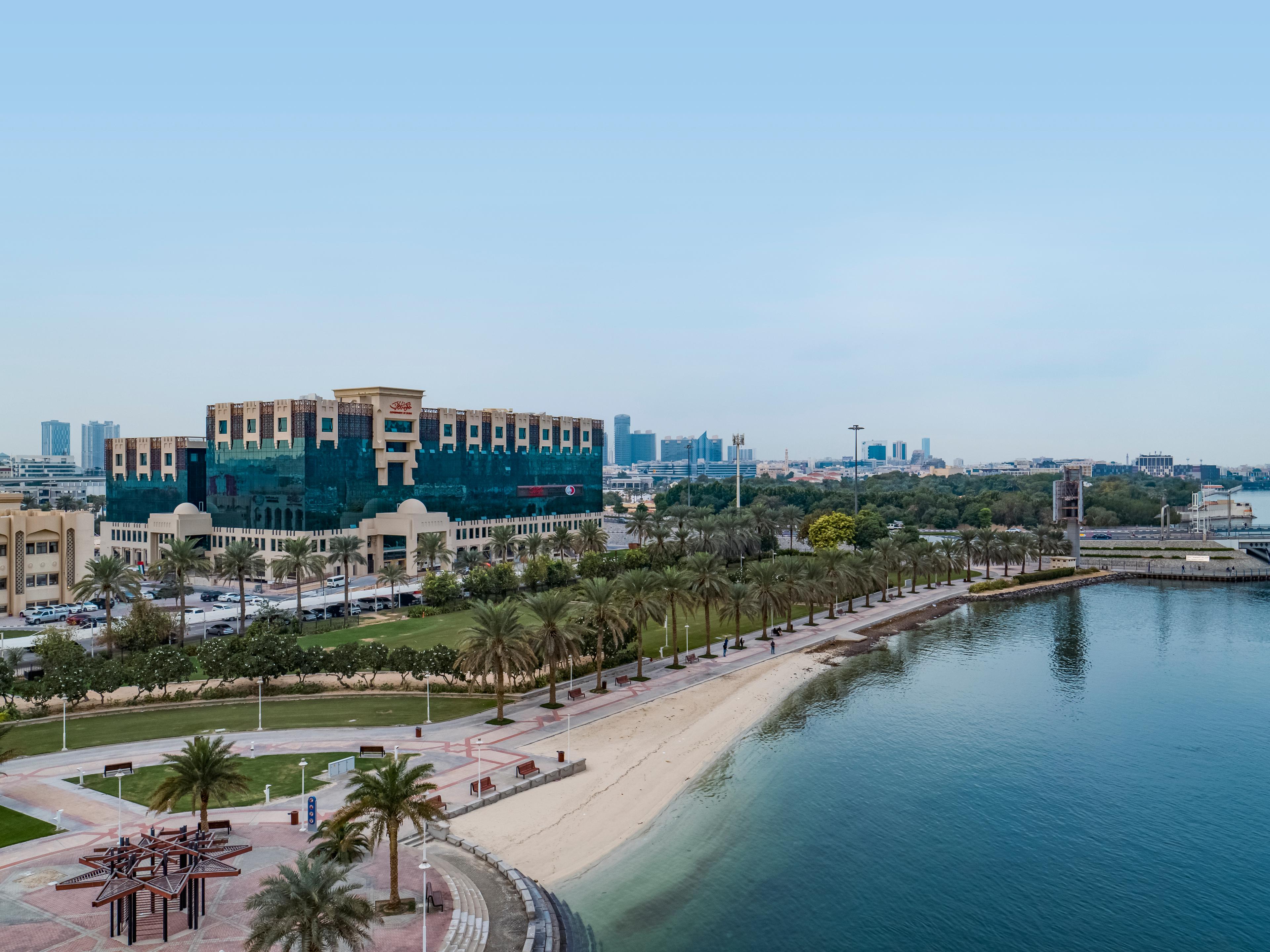Engineer reviewing server racks in a modern data center.